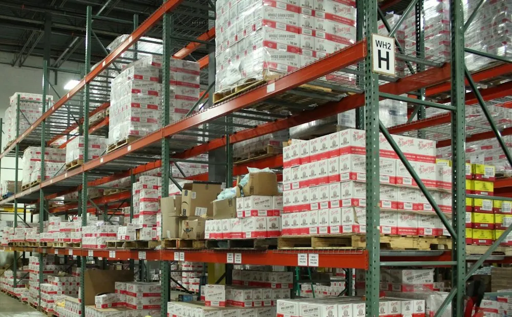 Warehouse racking stocked with boxed goods